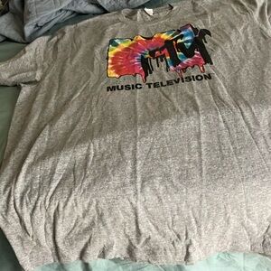 Grey MTV tee shirt. Made in Haiti of USA fabric.